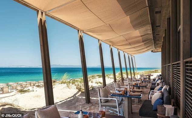Complementing JNCQUOI's restaurant is a cabana beach bar and sunbeds, exuding an Ibiza or St. Tropez vibe