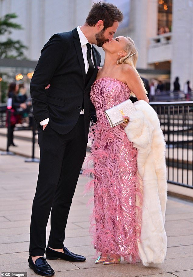 Hot couple: Kristin, who is known for her love of the color pink, opted for a nude-pink wedding dress by Pamela Rolland;  the couple is pictured at a gala in New York in 2021