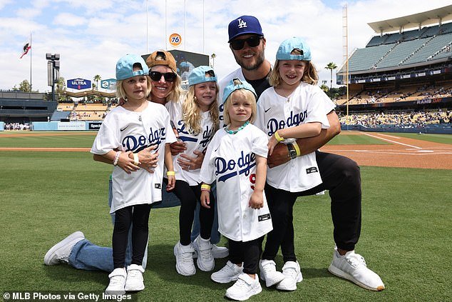 Stafford, Kelly and their kids pose for a photo ahead of a Dodgers game on Sunday