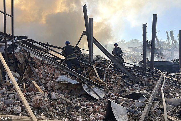 In this photo from the Ukrainian emergency service, emergency service personnel work to put out a fire following a Russian attack in Kryvyi Rih, Ukraine, Friday, September 8, 2023
