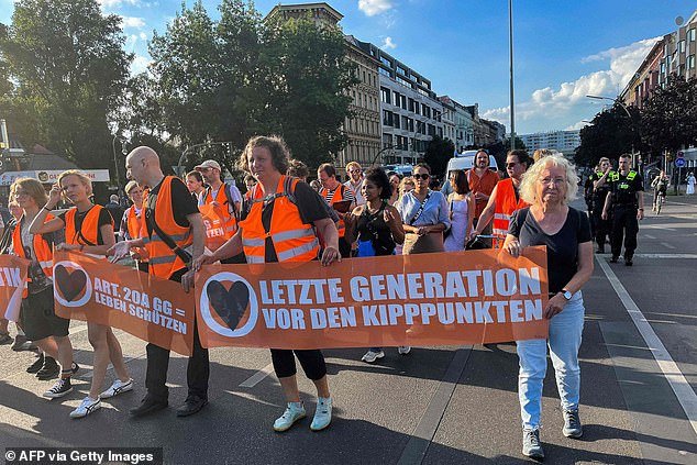 Climate activists of the "Letzte generation" (Last Generation) holds a protest march in Berlin's Kreuzberg district