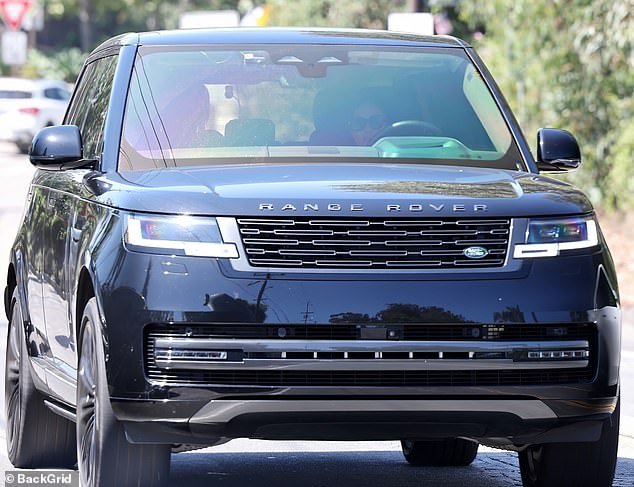 Photographers caught the Duchess of Sussex, 42, behind the wheel of a $140,000 black Range Rover on Thursday afternoon