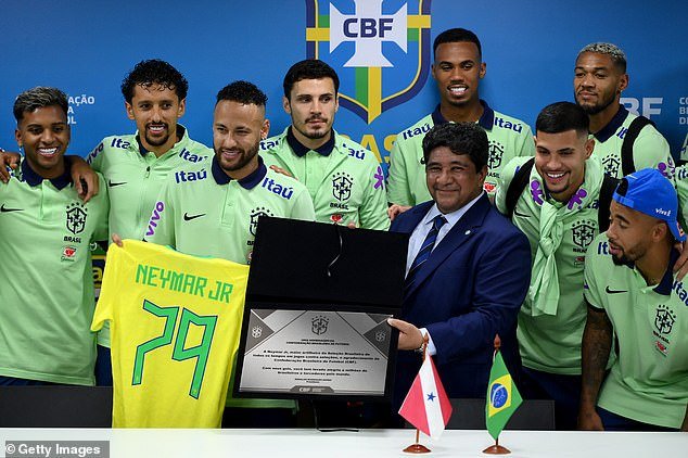 Neymar with his teammates after breaking the record as Brazil's all-time top scorer