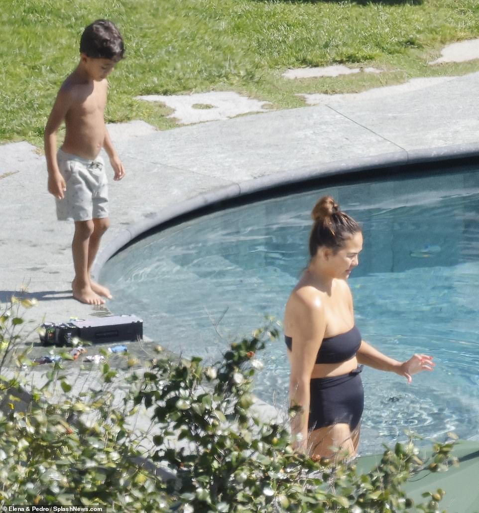 Pool hang: Teigen was spotted with her and John's 5-year-old son Miles