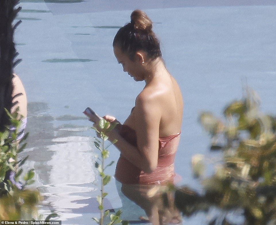 Relaxed: The Sports Illustrated cover star looked calm and collected as she took a dip