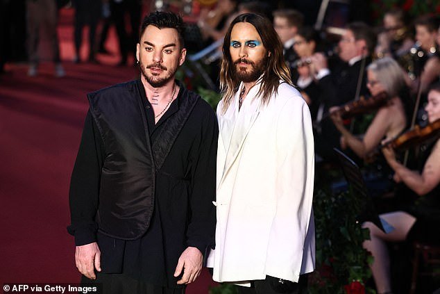 American actor and singer Jared Leto (R) and American drummer Shannon Leto of Thirty Seconds to Mars pose upon arrival at the "Vogue World: London"