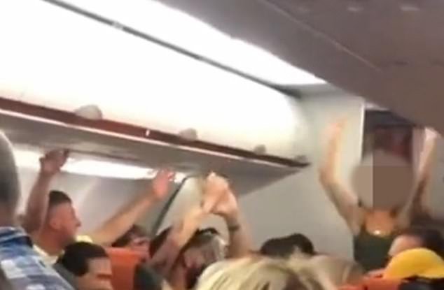 The couple who had sex in the toilet emerged and cheered during Easyjet flight from Luton to Ibiza