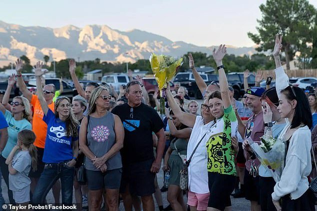 Mourners join Probst's family at the site where he was killed in Northwest Vegas