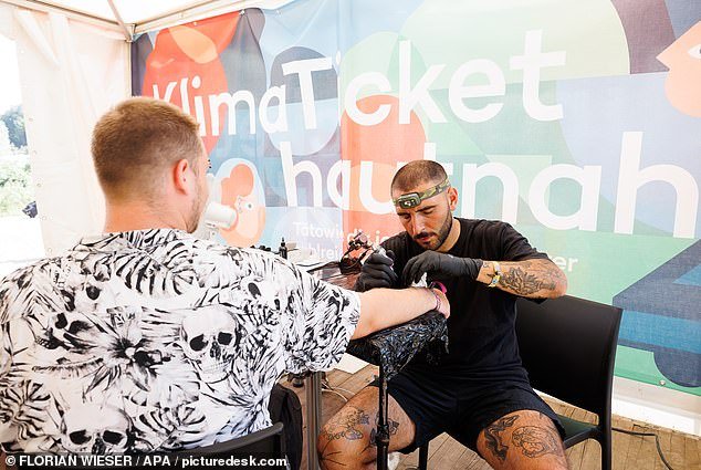 Pop-up tattoo parlors (above) were set up during the recent Frequency Festival and Electric Love Festival in Austria, and the first three people to register at each event received the pass