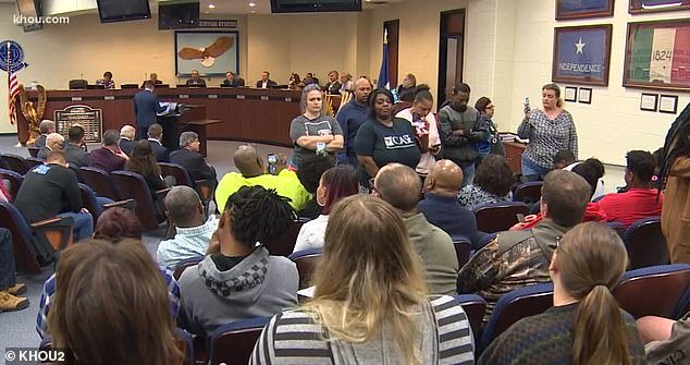 Activists turned their backs on speakers who defended Texas high school long hair policy