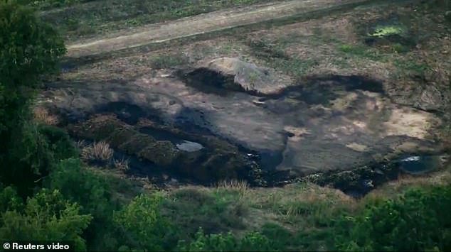 The scorched earth of the crashed fighter jet can be seen in South Carolina on Monday