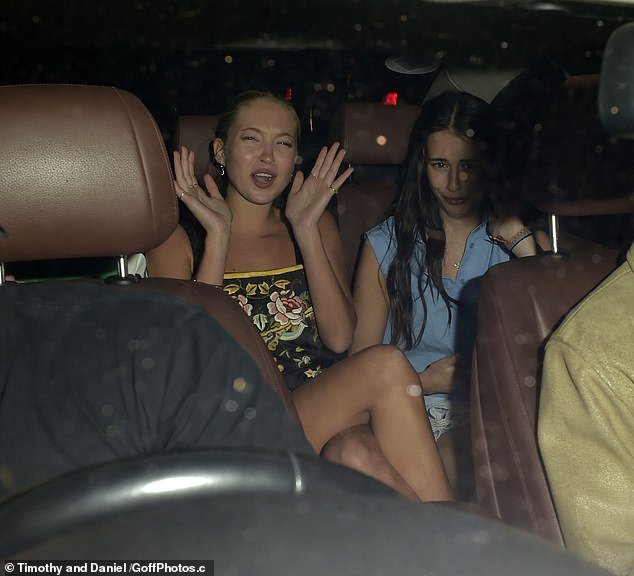 What a night!  The model got into the back of a car with her friends