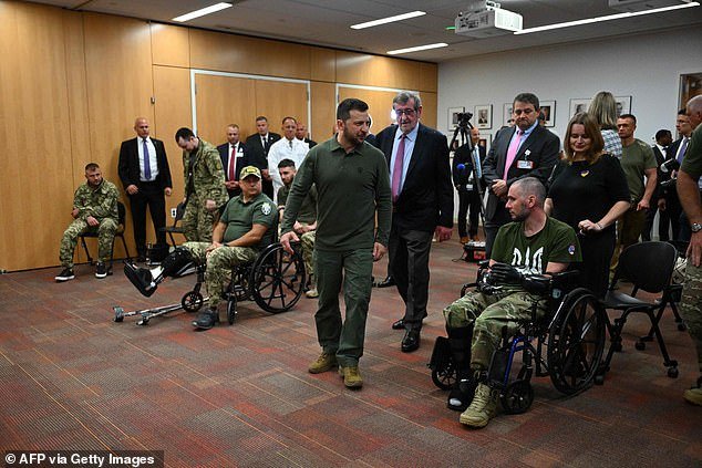 Some of the soldiers he visited were wheelchair-bound, while others had prosthetic limbs