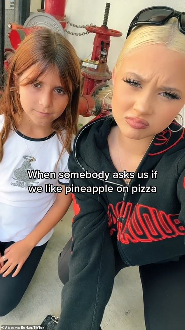 'When someone asks us if we like pineapple on pizza': She has also become close with 17-year-old stepdaughter Alabama Luella Barker (R), who enlisted Kardashian's 11-year-old daughter Penelope Scotland Disick (L) to in one of her TikTok videos from last year