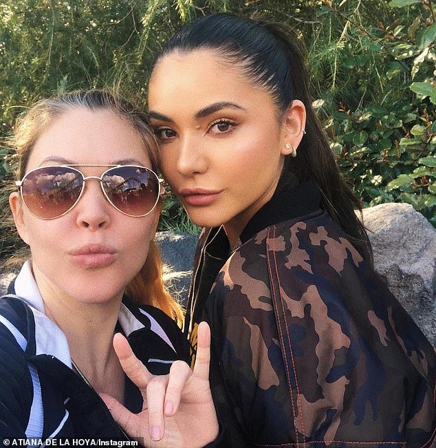 His ex: Kourtney's husband - Blink-182 drummer Travis Barker - also raised 24-year-old stepdaughter Atiana De La Hoya (R, photo in 2019) during his second marriage to Miss USA 1995 Shanna Moakler (L), which ended in 2008 after three years