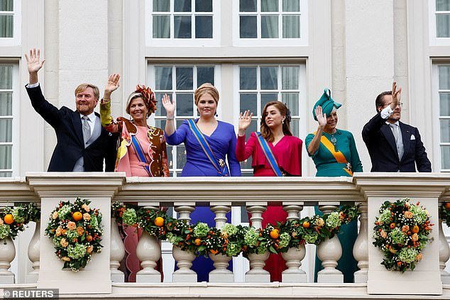 Thousands of well-wishers gathered on Budget Day when the Dutch royal family took to the balcony to wave.  In the photo from left: King Willem-Alexander of the Netherlands, his wife Queen Maxima, Princess Amalia, Princess Alexia, Princess Laurentien and Prince Constantijn