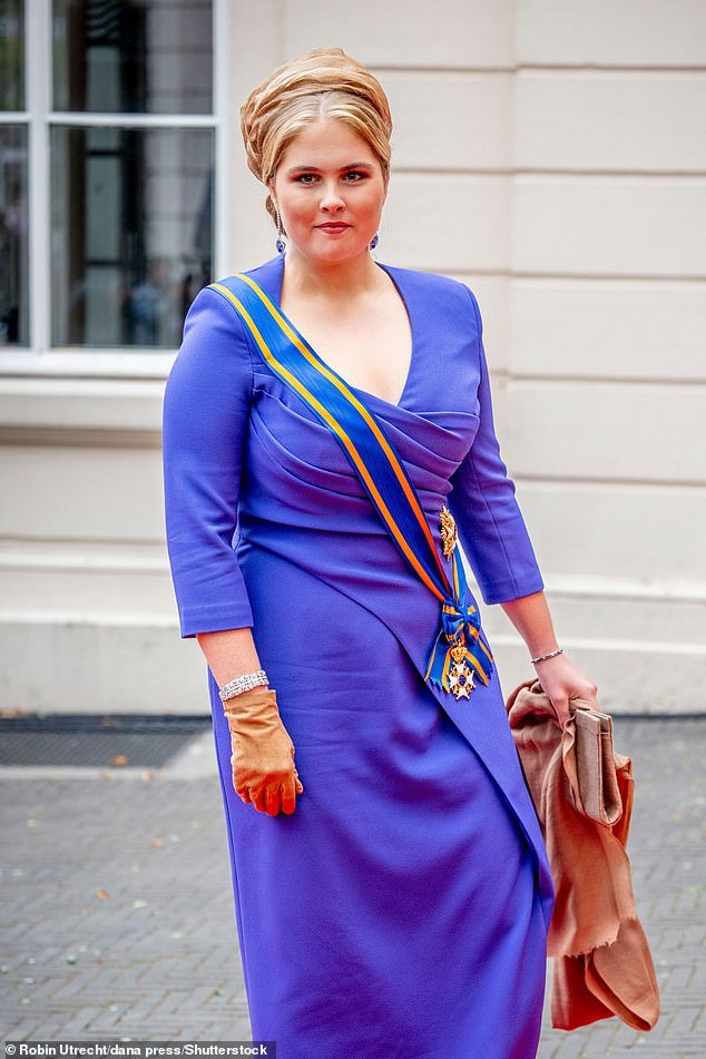 Meanwhile, Crown Princess Amalia, 19, wears a bright purple dress and her blonde hair neatly in an updo