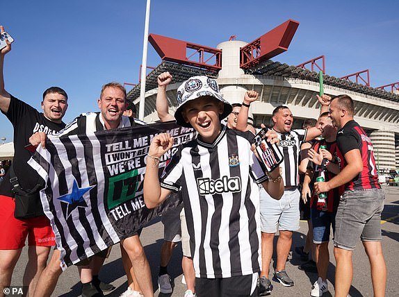 Newcastle United fans pose for a photo outside ahead of the UEFA Champions League Group F match at San Siro, Milan.  Photo date: Tuesday, September 19, 2023. PA Photo.  See PA story FOOTBALL Newcastle.  Photo credit should read as follows: Owen Humphreys/PA Wire RESTRICTIONS: Use subject to restrictions.  Editorial use only, no commercial use without prior permission from the rights holder.