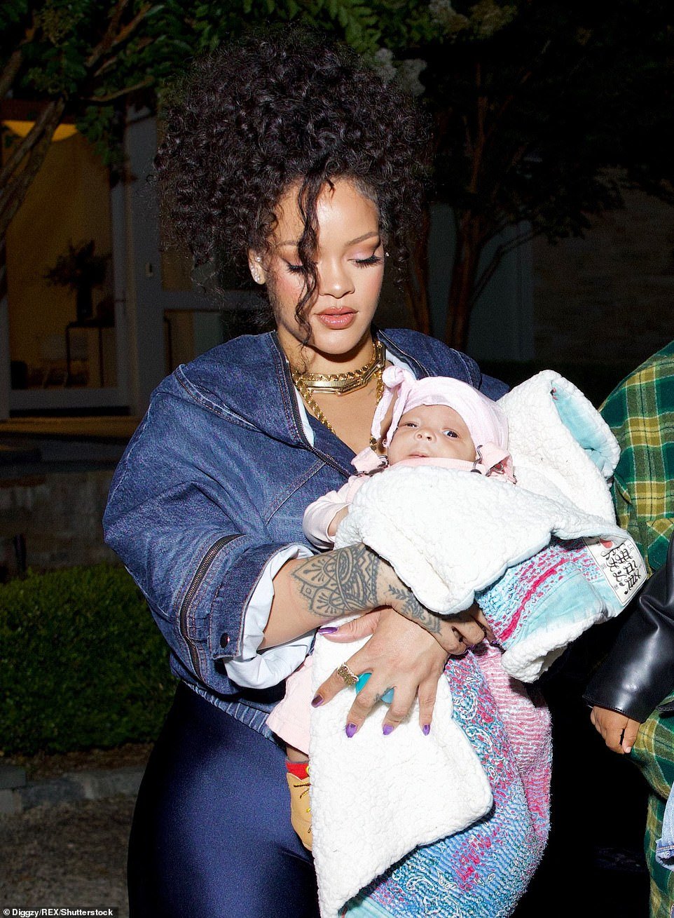 Precious cargo: Rihanna looked beautiful as she cradled her son
