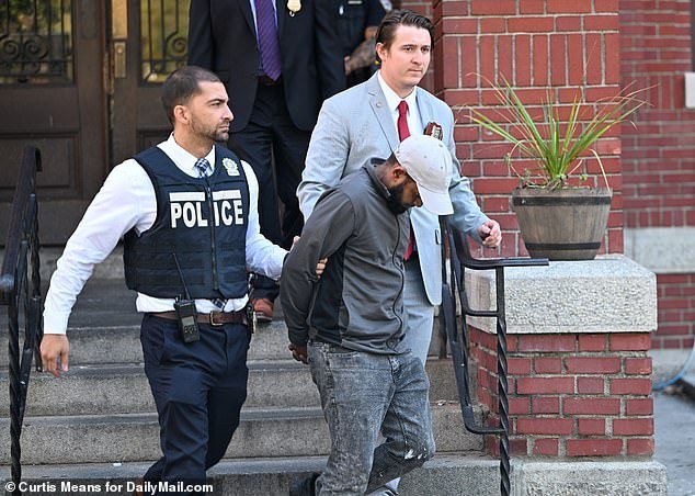 De Ventura's alleged co-conspirator, Carlisto Acevedo Brito, 41 (pictured), kept his head down as he left New York's 52nd Precinct after also being arrested in connection with the overdose.