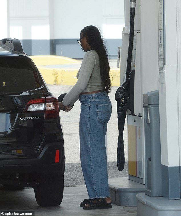 Sasha, who seemed alone, laid hands on her while she was filling up with gas at the gas station.