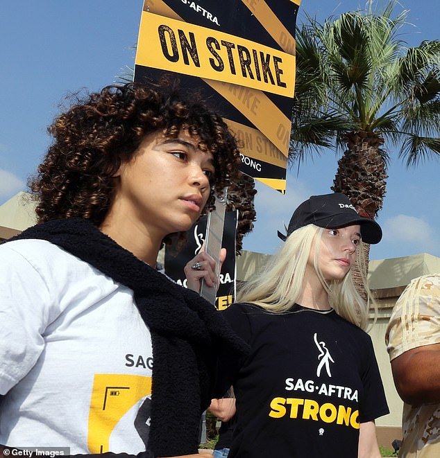 (L to R) Alexandra Shipp and Anya Taylor-Joy join the picket line outside Paramount Studios on September 19, 2023 in Los Angeles, California
