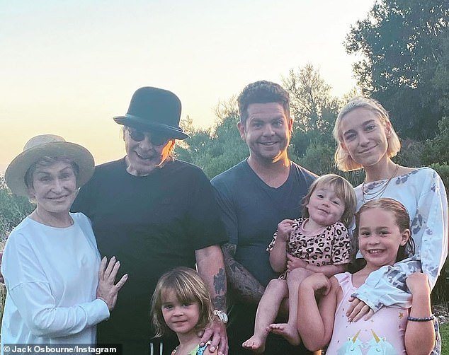 Family: Jack gained worldwide attention on his family's reality show The Osbournes.  Pictured: Jack with Aree, his children Pearl, Andy and Minnie, and parents Ozzy and Sharon