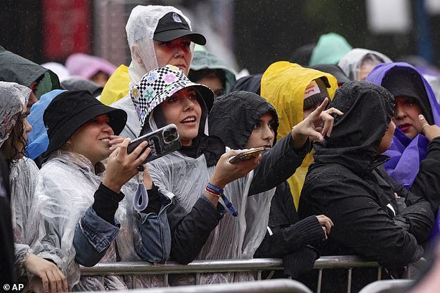 The Global Citizen Festival, held in Central Park, went ahead despite the wet weather on Saturday night - as festival-goers in the Big Apple braved the deluge to watch big names like the Red Hot Chili Peppers and Lauryn Hill