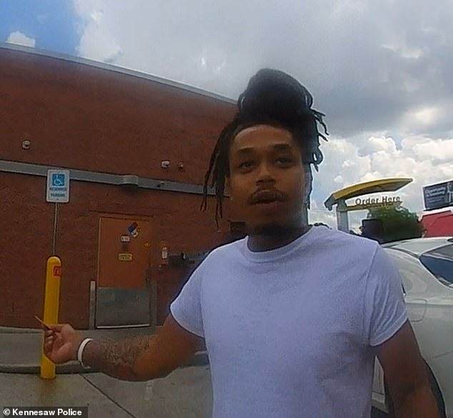 Antoine Sims, 24, was wearing an ankle monitor and was suspected of murder when he called 911 to complain about the cold fries he was served at a McDonalds in Kennesaw, Georgia