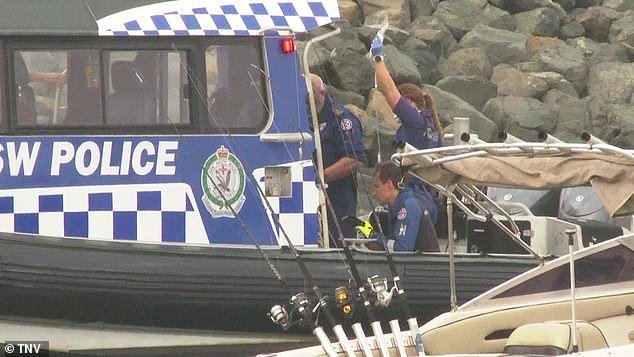 Officers pulled two men from the water in Botany Bay, in Sydney's south-east, early on Saturday morning
