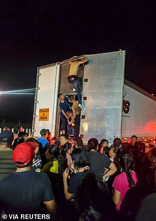 Hundreds of 'dehydrated' migrants, including children, were found in the back of a truck in Mexico after authorities heard their horrifying cries