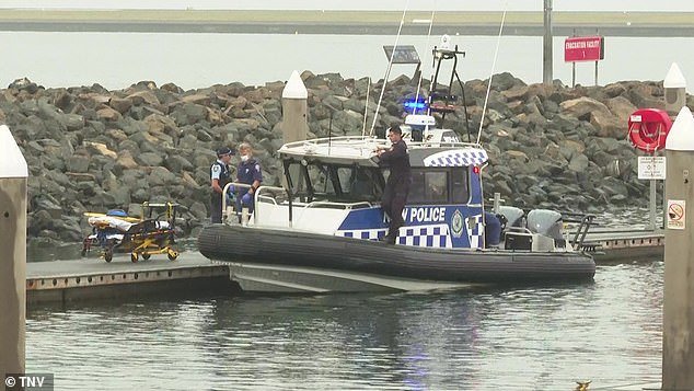 One man died and another was injured after their boat struck a whale and overturned off the coast of Sydney