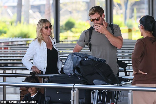 Chris Hemsworth, 40, (right) bonded with mother-son on Saturday when he was spotted arriving at Sydney International Airport with his mother Leonie van Os, 62, (left)