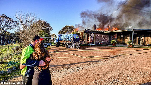 Social media influencer and former fitness competitor Grace Torres watched her property in Sutton, NSW go up in flames around 4:30pm Thursday (pictured)