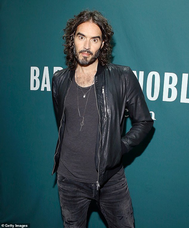 Russell Brand, 48, pictured at a 2017 event for his book Recovery: Freedom From Our Addictions, receives support from a close friend from his sobriety circle who has been left 'shocked'