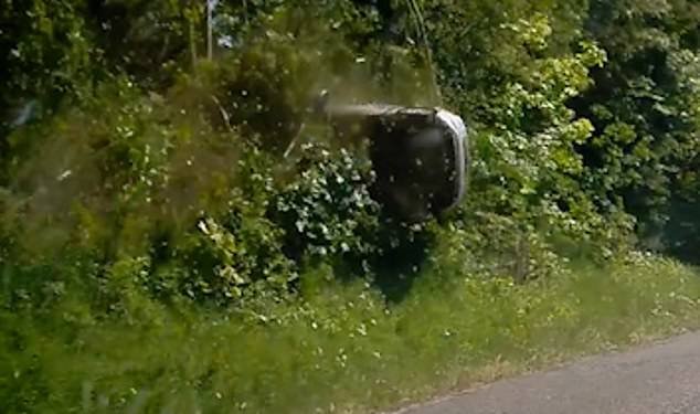 Heartbreaking images then showed the moment when the car ended up on its roof