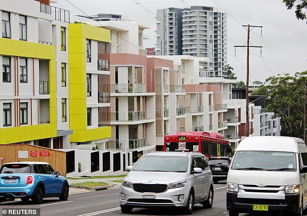 Australians are increasingly living in Chinese-style high-rise residential towers as record immigration has made housing so unaffordable (pictured are apartments in Epping in Sydney's north)