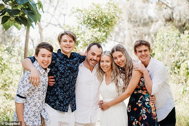 Before starting chemotherapy, the couple married (Angela and Paul pictured with their two children and stepchildren - pictured left to right Riley, Jakob, Paul, Angela, Maddy, Riley)