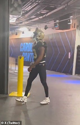 Video captured from inside one of the two tunnels at Bank of America Stadium shows Thomas yelling something at Brown