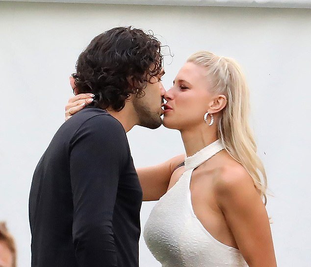 Loved up: Strictly Come Dancing's Graziano Di Prima was spotted receiving a heartfelt kiss on the lips from his wife Giada Lini ahead of Saturday's live show