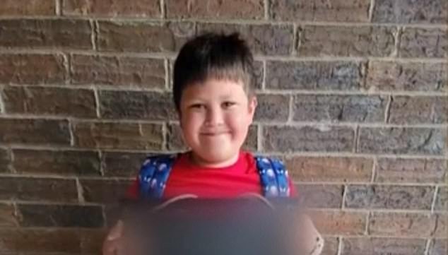 Matt McCormick, who picked up his six-year-old son (pictured), was shocked by the scene