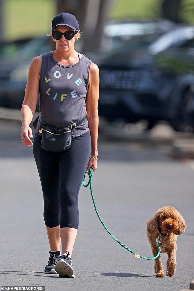 Toni Collette looked strong and confident as she walked her dog in Sydney on Friday