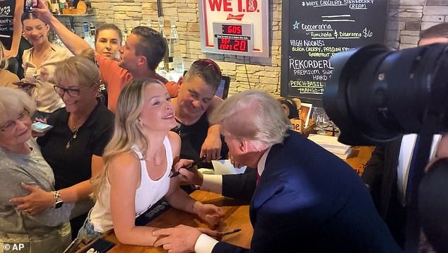 Trump made the comments during a trip to Iowa, where he signed the tank top of an eager waitress before inking her forearm at a campaign event.