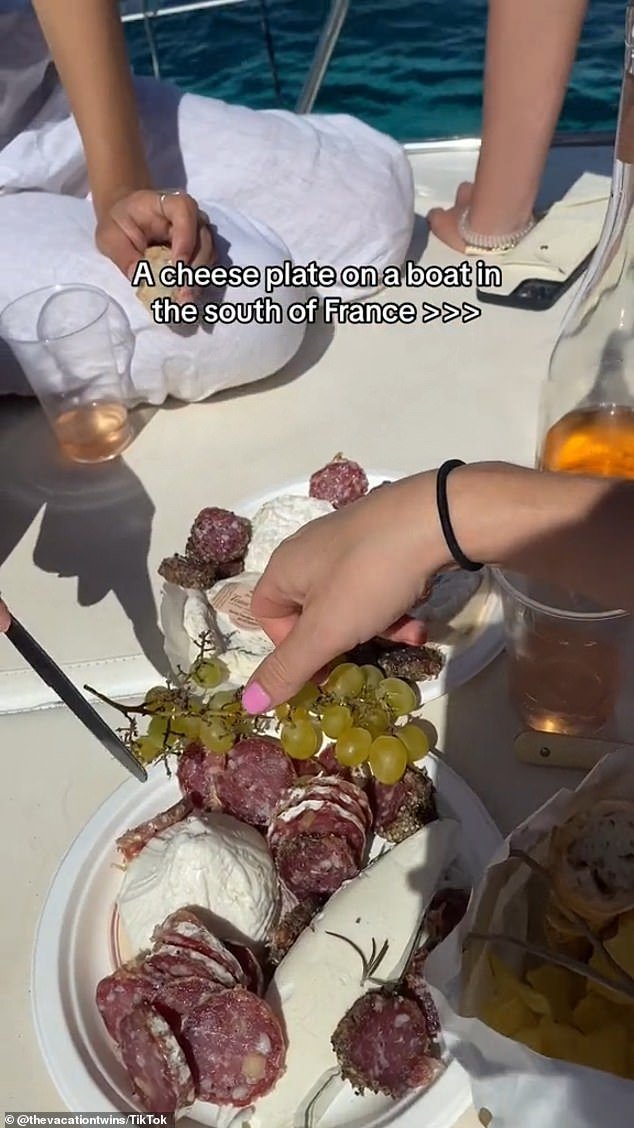 Another clip showed a decadent-looking cheese platter that the friends also ate on the water