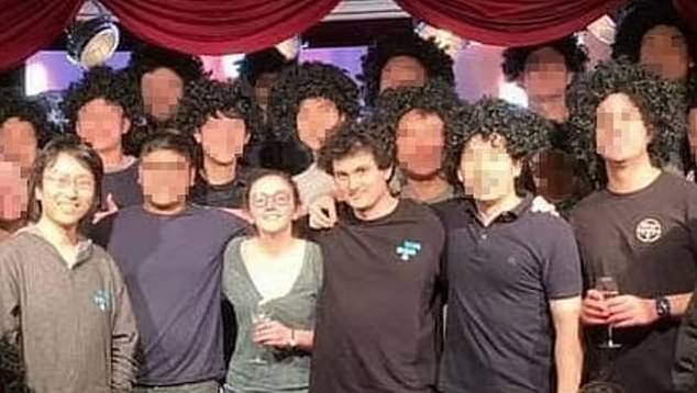 Bankman-Fried, with Alameda Research CEO Caroline Ellison and FTX co-founder Gary Wang, to their left, at Bankman-Fried's birthday in Hong Kong.  The group dressed up in wigs that resembled Bankman-Fried's hairstyle