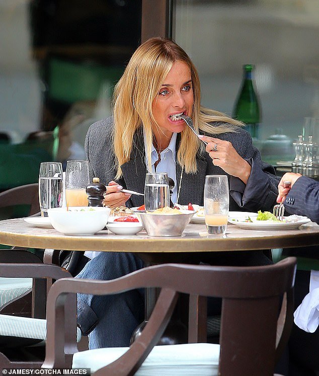 Lunch date: The pop star looked relaxed as she enjoyed her meal outside at Cecconi's Mayfair in the British capital