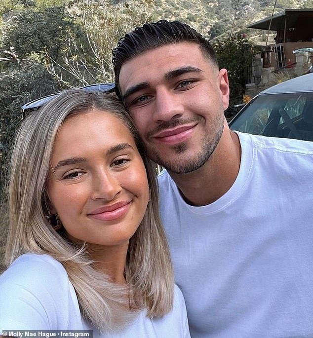 Support: Tommy said Molly-Mae doesn't like the sport and revealed she only 'tolerates' boxing because it makes him happy, praising her for doing it