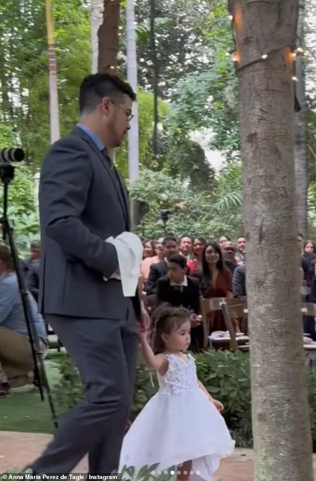All eyes on her: Anna's beautiful two-year-old daughter Amelia played a pivotal role at the wedding as she served as flower girl for the festivities
