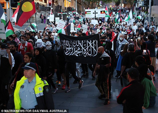 Protesters marched from the Town Hall towards the Sydney Opera House, chanting 