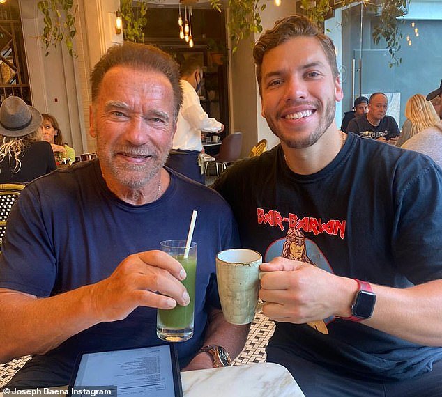 Arnold is pictured with his youngest child, Joseph, who turned 26 earlier this month